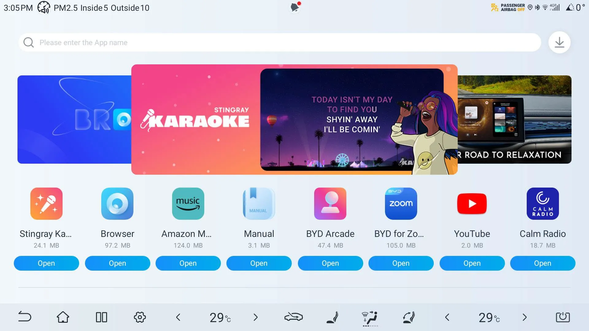 BYD Store home screen on the head unit: a search field reading Please enter the App name, a Stingray Karaoke promo banner and app tiles for Stingray Karaoke, Browser, Amazon Music, Manual, BYD Arcade, BYD for Zoom, YouTube and Calm Radio, each with its download size and an Open button.
