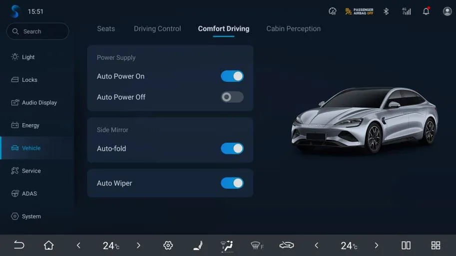 Head-unit vehicle settings, Comfort Driving tab, with a Power Supply group showing Auto Power On switched on and Auto Power Off switched off, plus Side Mirror Auto-fold and Auto Wiper toggles, next to a rendering of a SEAL.